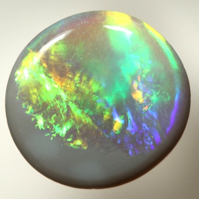 SOLID SEMI BLACK OPAL Flame pattern of orange, green and blue
